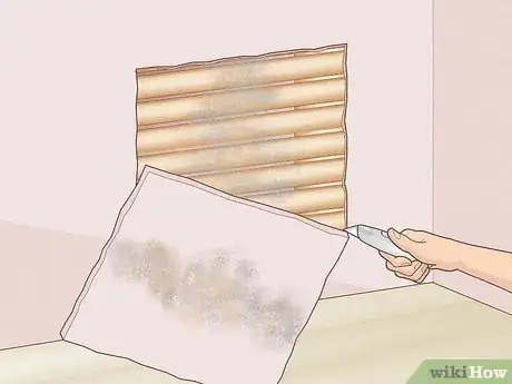 Image titled Dry Damp Walls Step 3