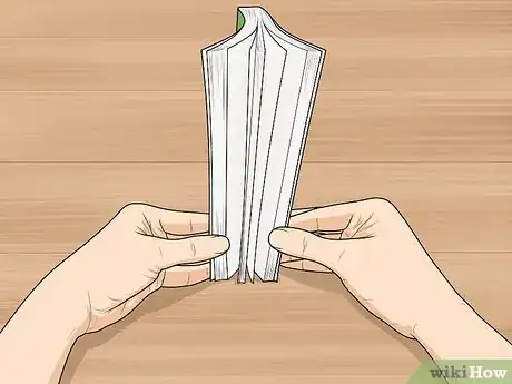 Image titled Remove the Mildew Smell from Books Step 1