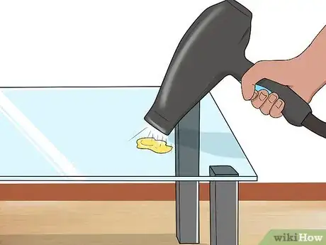 Image titled Remove Wax from a Glass Table Top Step 1