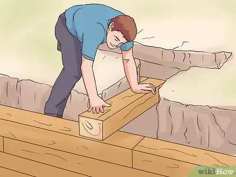 Image titled Build a Strong Retaining Wall with 4x4 Treated Post Step 14