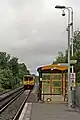 A Merseyrail Class 507 approaches the station.