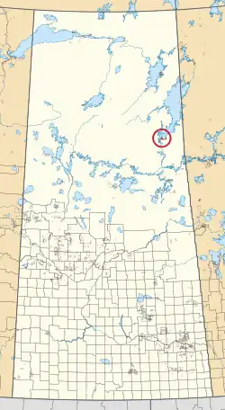 A map of the province of Saskatchewan showing 297 rural municipalities and hundreds of small Indian reserves. One is highlighted with a red circle.