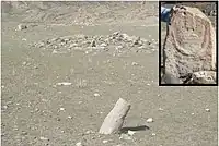 Chemurchek burial mound in western Mongolia, along with accompanying standing stone.