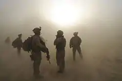 Soldiers of the 501st Infantry Regiment at Forward Operating Base Kushamond during a sandstorm.