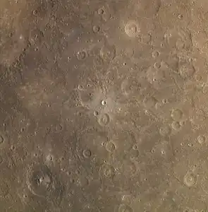 Slightly oblique exaggerated color view from MESSENGER, with Grainger in lower left