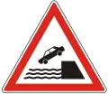 A-012Unprotected quayside or riverbank ahead