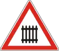 A-038Level crossing with gates or barriers