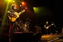The John Butler Trio (left to right: John Butler on guitar, Nicky Bomba on drums, Byron Luiters on bass) performing in Toronto c. 2012