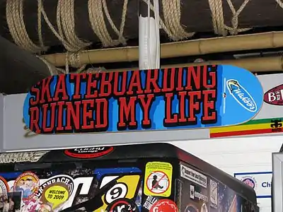 Decorations include equipment bolted to the walls