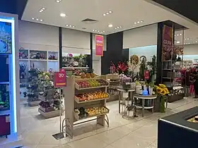 Wax fruit and artificial flowers