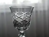 Crystal glass before a black background